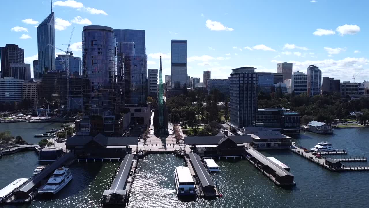 Swan Bells at Barrack Street Jetty - Aerial view - Perth CBD skyline - flying in to closeup