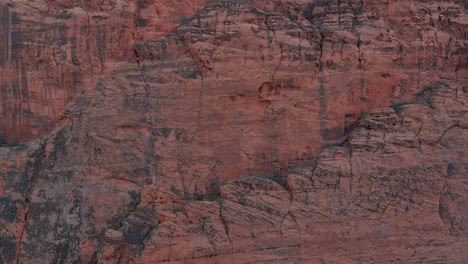 rising aerial shot of utah's gigantic lava flow mountains