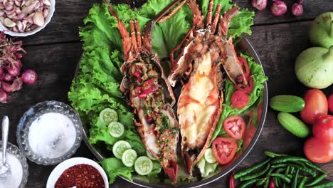 beautiful top down view lobster plate with vegetables displayed on decorated wooden table