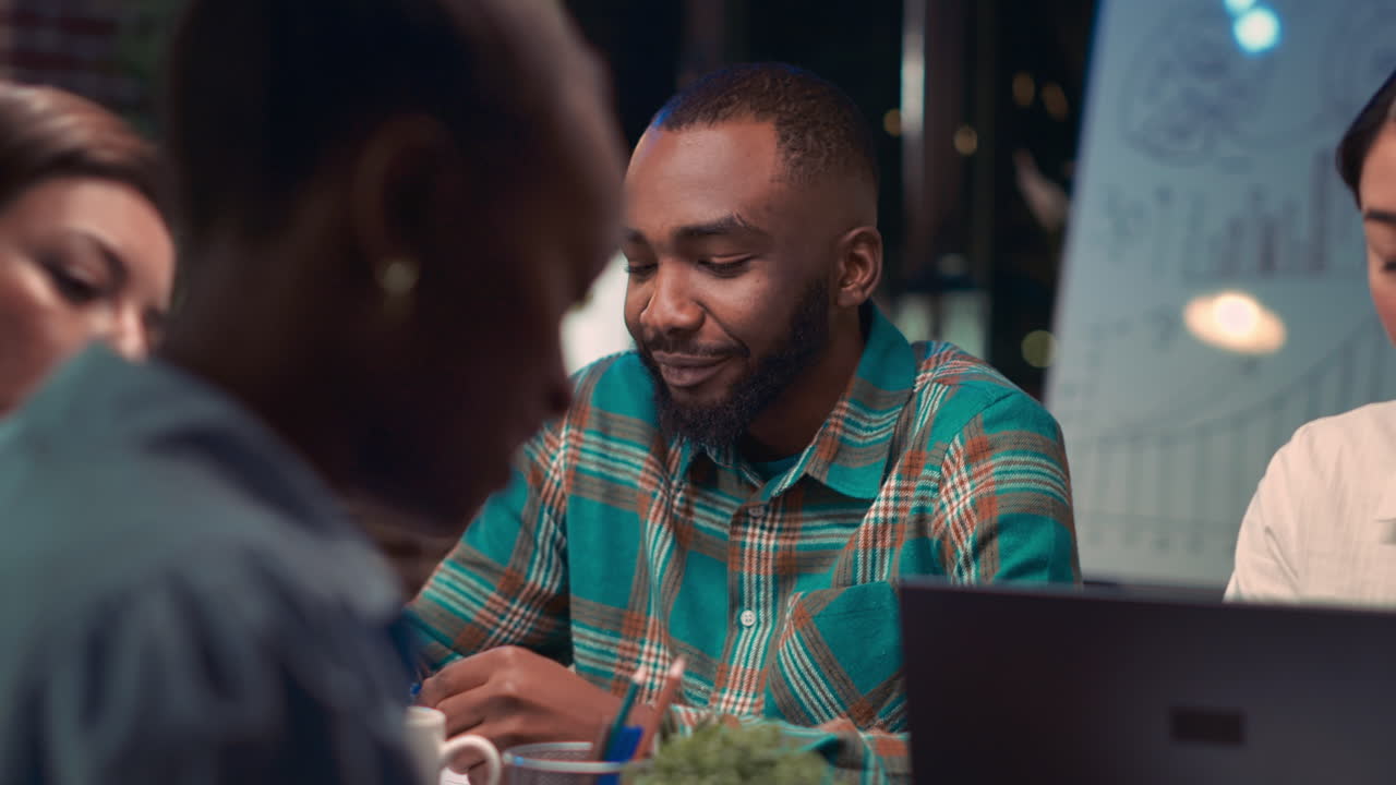 African american employee smiling portrait in business meeting