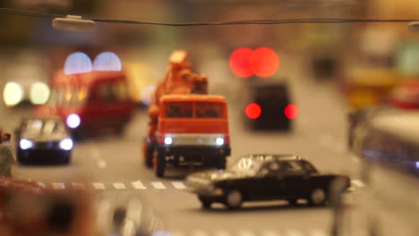 miniature city street scene at night
