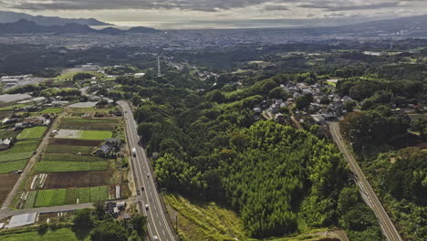 mishima japan aerial v3 cinematic drone flyover sasahara shinden capturing agricultural farmlands, hillside landscape, cityscape and suruga bay views - shot with mavic 3 pro cine - october 2023