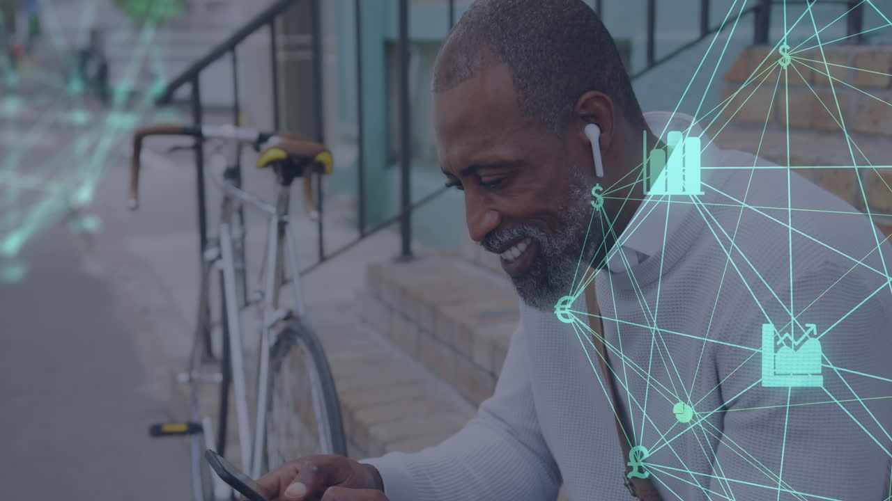 Globe of digital icons spinning against african american senior man using smartphone