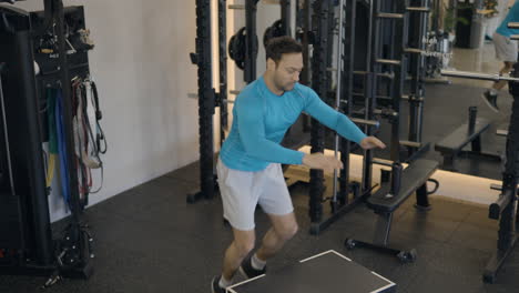 plyometric exercises with a man doing plyo box jumps for good balance and coordination