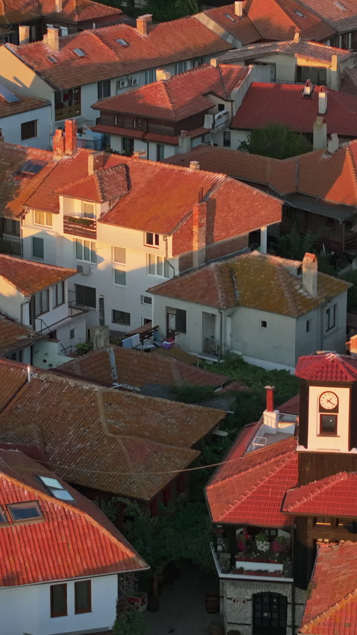 Aerial drone view of the old town Nessebar, Bulgaria at sunset. Vertical