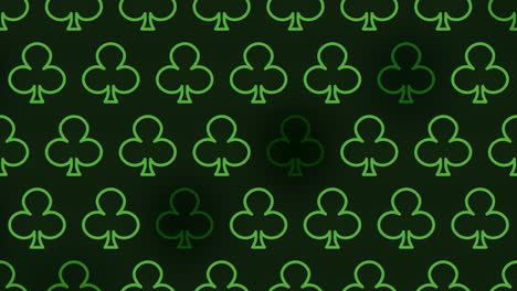 Green-playing-cards-create-a-deck-like-pattern-on-a-black-background