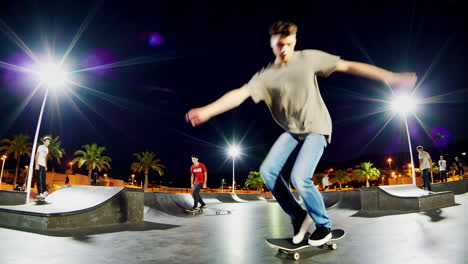 skateboarding action at a night skatepark