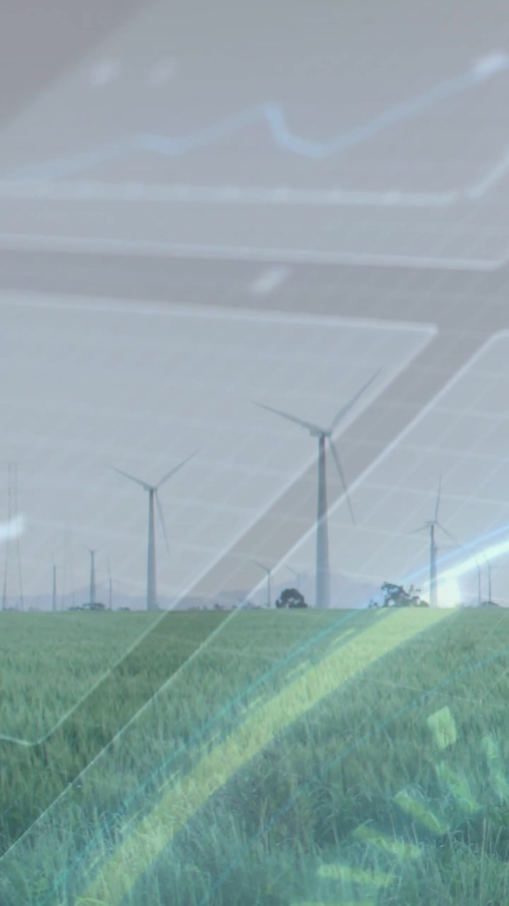 Video verticale: Turbine e campo immobili mentre un'overlay scorre, mostrando dati sull'energia eolica.