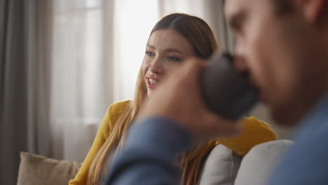 closeup overjoyed woman talking emotionally chilling with boyfriend. joyful lady