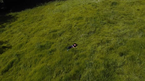 Young-children-joyfully-playing-and-frolicking-in-vibrant-green-lawns