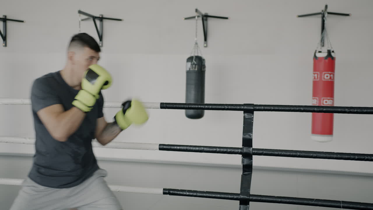 Man Boxing in a Ring
