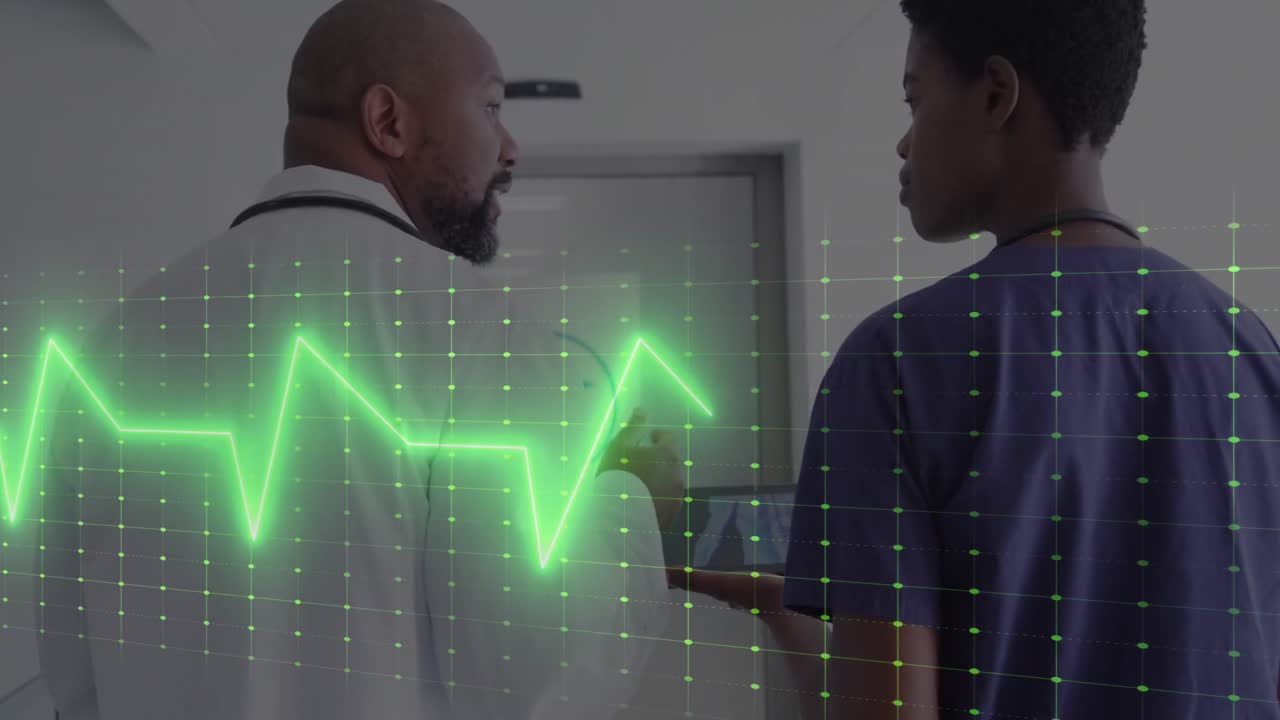 Animation of vital signs reading over african american female and male doctor using tablet talking