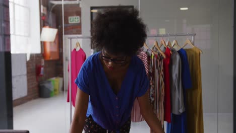 portrait of african american female fashion designer looking to camera and smiling