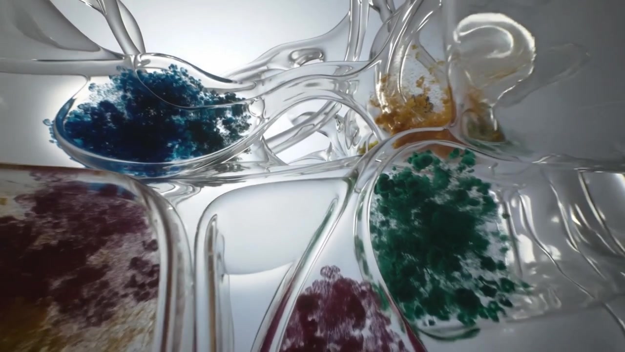Sliding camera revealing translucent sculpture in lightbox, showcasing colored pigment clusters