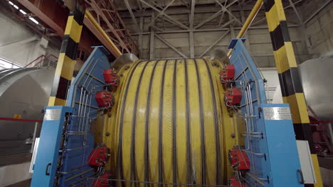 industrial cable reel in a factory setting