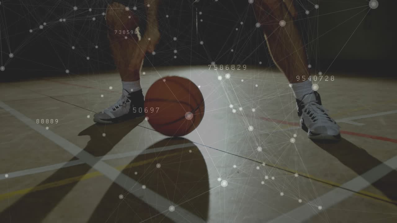 Male basketballer starting low dribbling thru legs switching hands training nodes around ball, feet