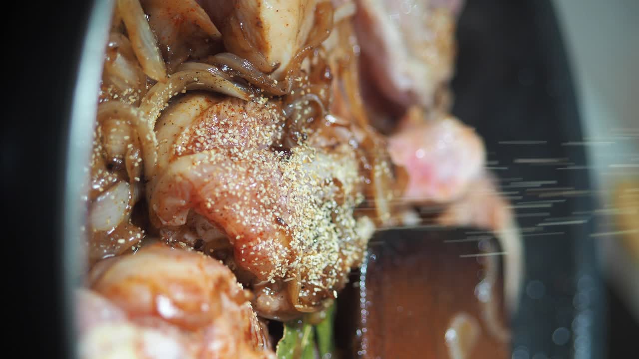 Close-up of Spiced Meat and Vegetables Cooking in a Pan