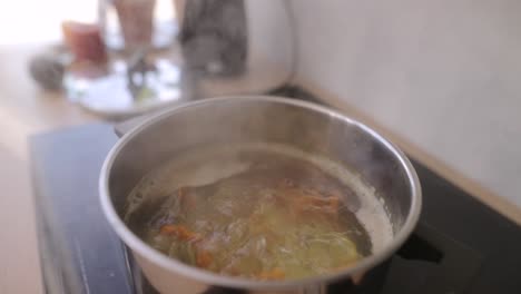boiling soup in a pot