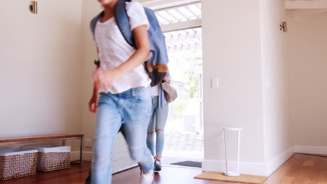 Mother-And-Children-Returning-Home-After-School-Day