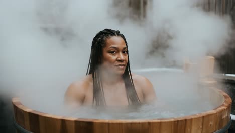 serenity in steam: a captivating journey through a relaxing hot stone bath surrounded by gentle mist and tranquil atmosphere