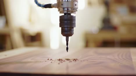 close-up views of a precision drill in action, capturing the intricate details of woodworking and the process of shaping fine wooden surfaces with expert craftsmanship