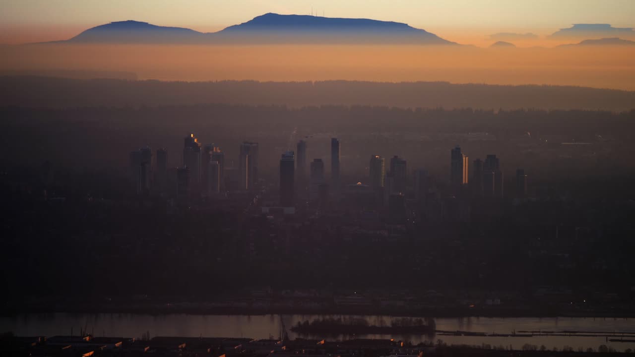 Dramatic View Of Sunset At Surrey City Along Fraser River In British Columbia, Canada. Aerial Drone Shot