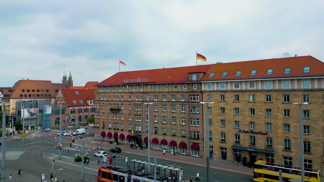 4K Aerial Drone Video of Trains in Front of the Grand Hotel in Downtown Nurnberg, Germany