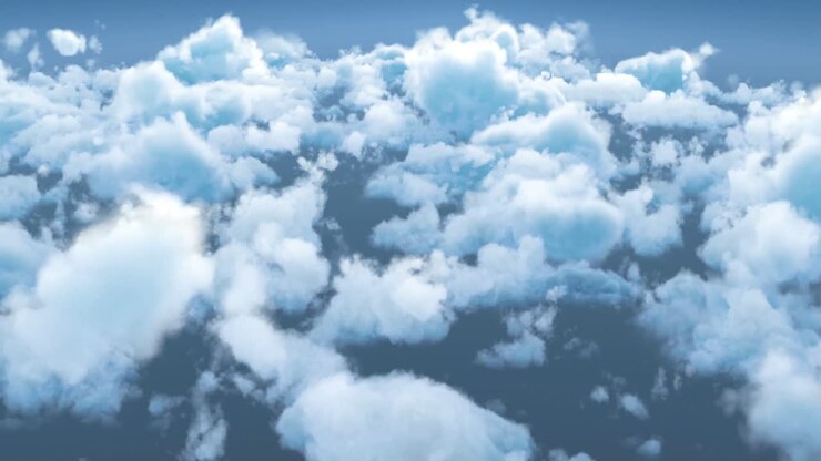 White fluffy clouds in blue sky
