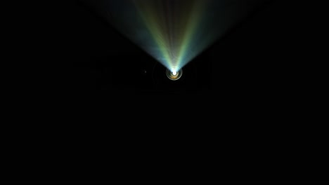 Video-projector-beam-shining-through-smoke-with-jib-moves