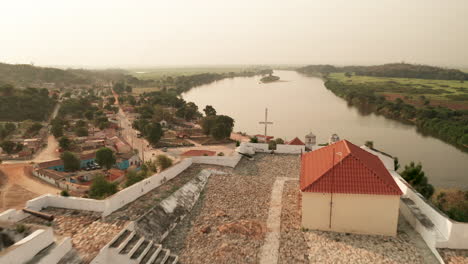 traveling-front,-Muxima,-place-of-religious-worship,-Angola,-Africa,-the-Kwanza-river-in-the-background-2