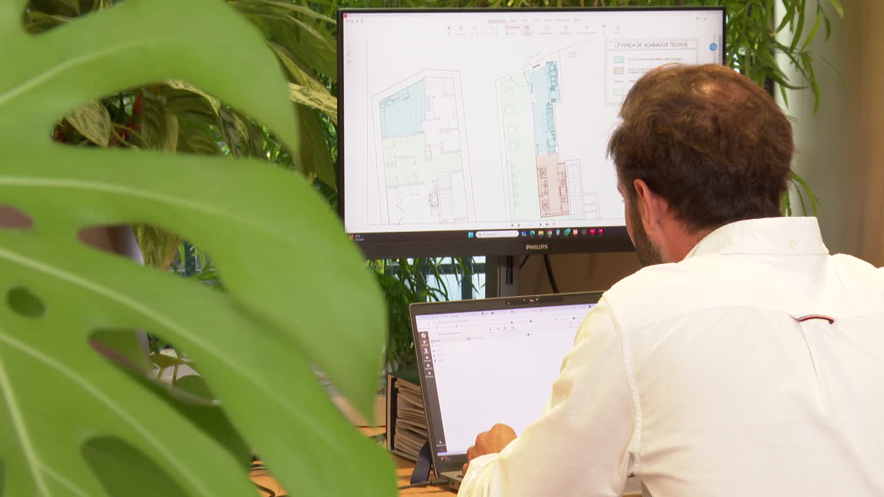 Interior designer working on a floor plan