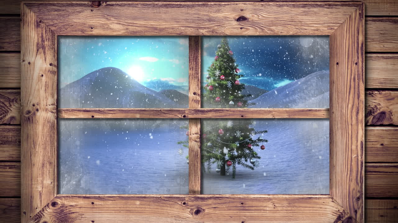 Wooden window frame against snow falling over christmas tree on winter landscape