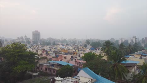 aerial view of a big city township houses corporate city video background, a small corporate township cinematic drone shot video background in foggy weather in mumbai, india