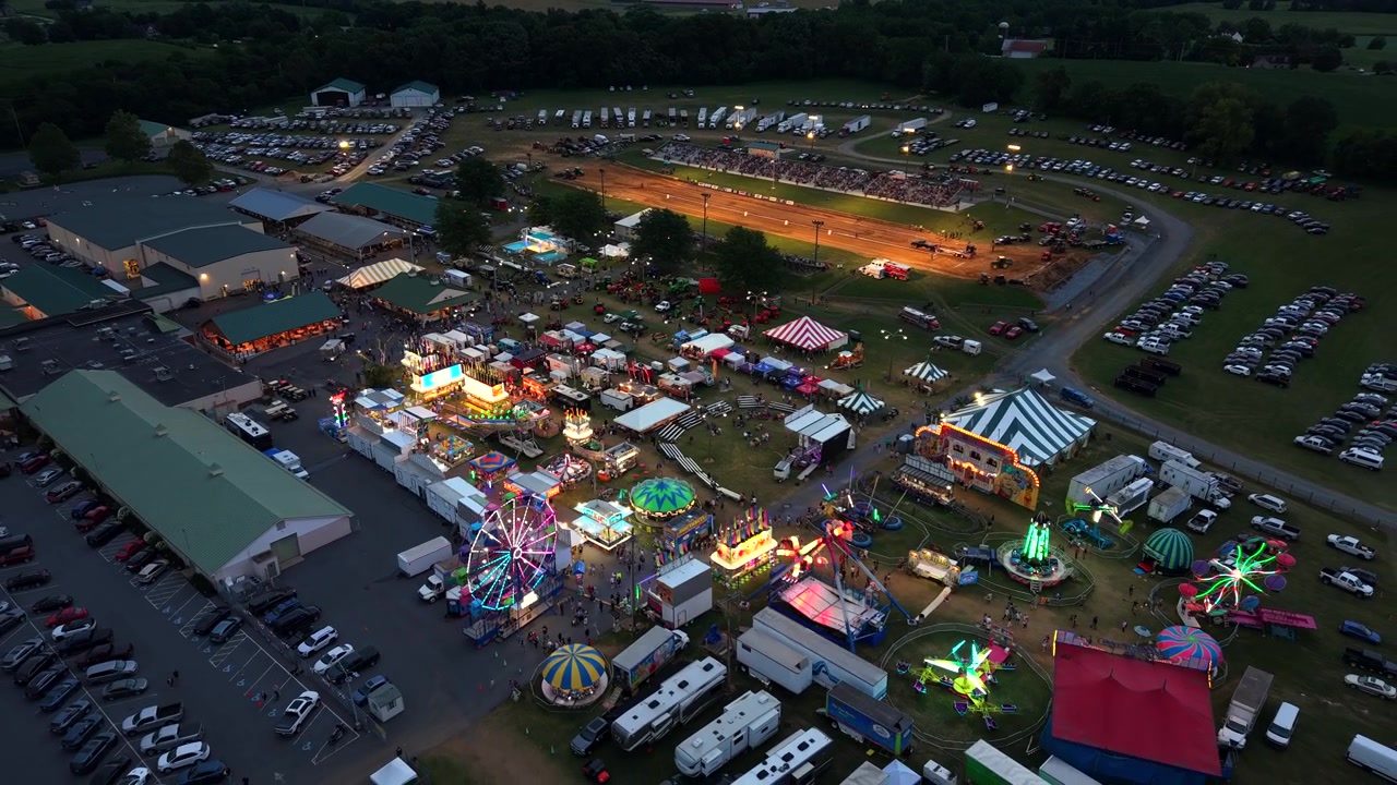 Aerial view of fair at night time.