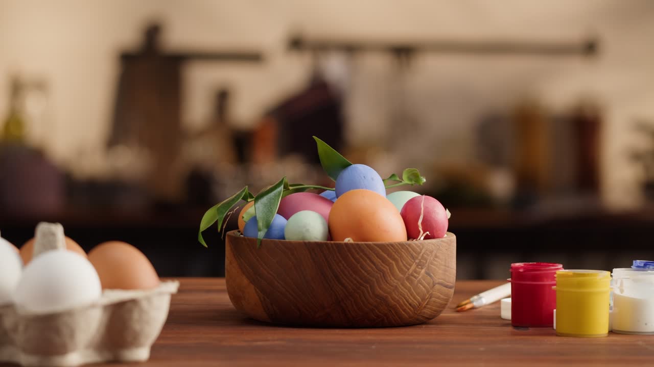 Happy Easter holiday. Colored eggs close-up. Preparing for Easter, painting and decorating eggs. Christian celebration, family traditions.