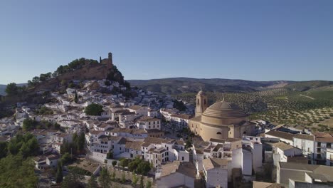spain. montefrio. pretty spanish town, famous by national geographic. panoramic aerial view. white villages, houses on mountain slopes. andalusia. spain.