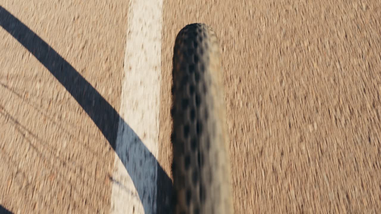 Bicycle tire on asphalt road