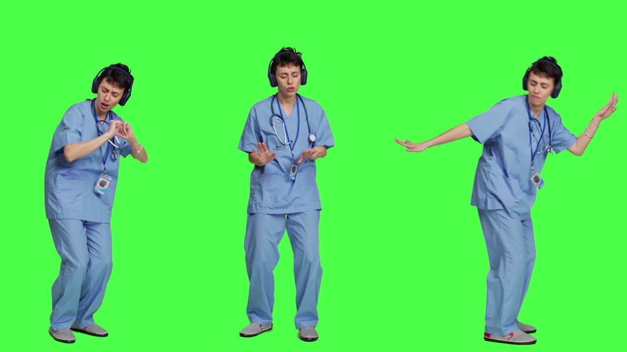 무선 헤드폰으로 음악을 듣는 재미있는 간호사