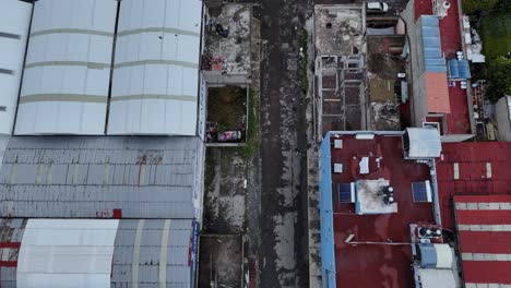 aerial view of damaged streets and buildings in a mexican city