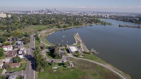 a 4k high-flying drone shot of sloan’s lake, the biggest lake in the city of denver, colorado, and home to the second largest park in the city, and a myriad of outdoor activities