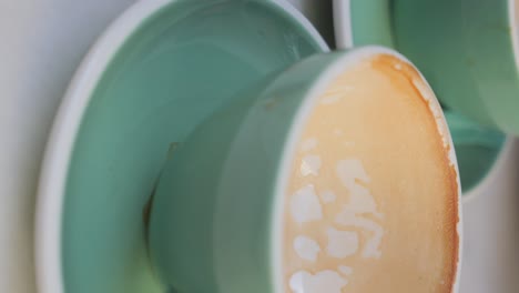 empty coffee cups on a table