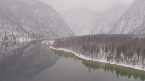 aerial drone of european winter lake - ungraded