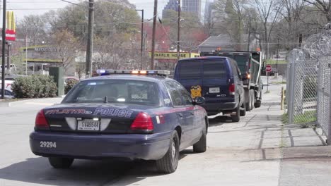 atlanta police cars parked with flashing lights
