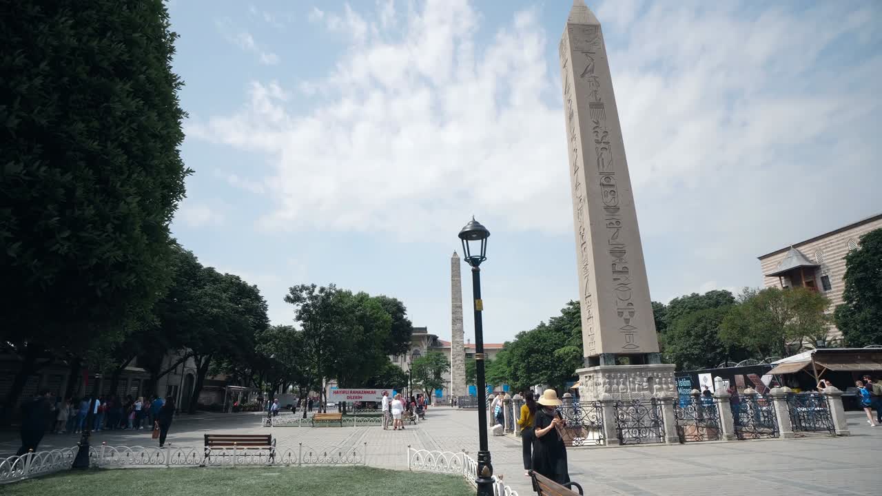 Obelisk of Theodosius (Dikilitas) with hieroglyphs in Sultanahmet Square, Istanbul, Turkey. Ancient Egyptian obelisk in Istanbul City