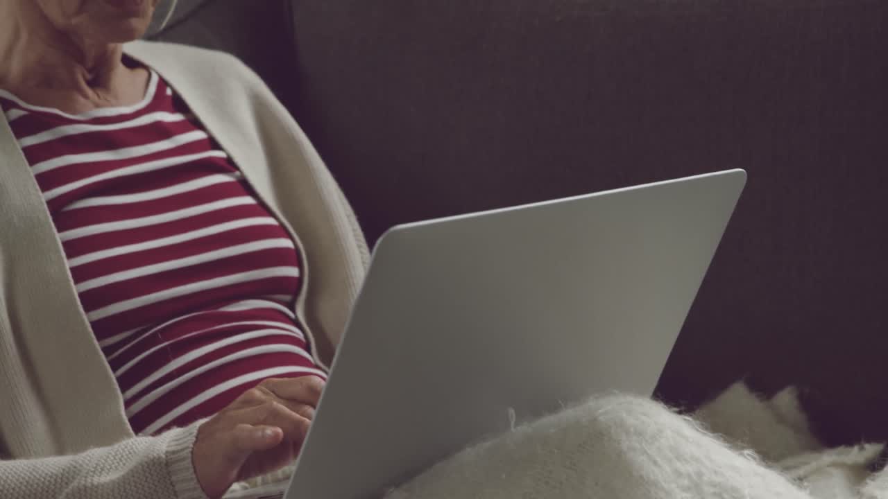 Senior woman alone at home