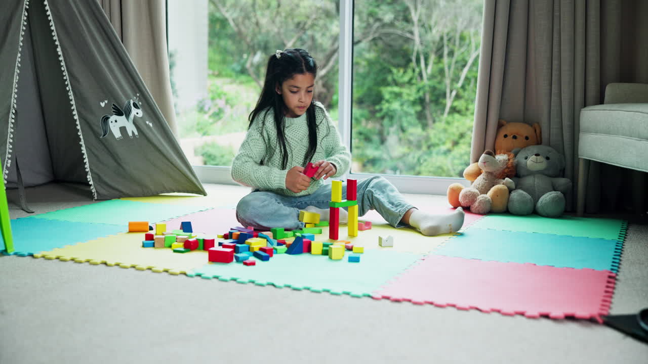 Girl playing with toys in playroom