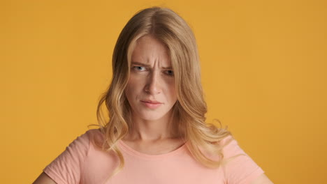 Caucasian-woman-looking-upset-on-camera.