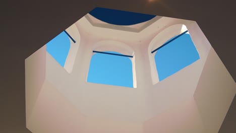 greek style open roof window day time in santorini in greece low angle