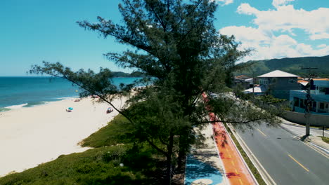 Drone-Footage-of-Jaconé-Beach,-Main-Street,-division-of-Maricá-and-Saquarema-boroughs-in-Rio-de-Janeiro,-Brazil