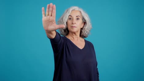 woman making a stop gesture